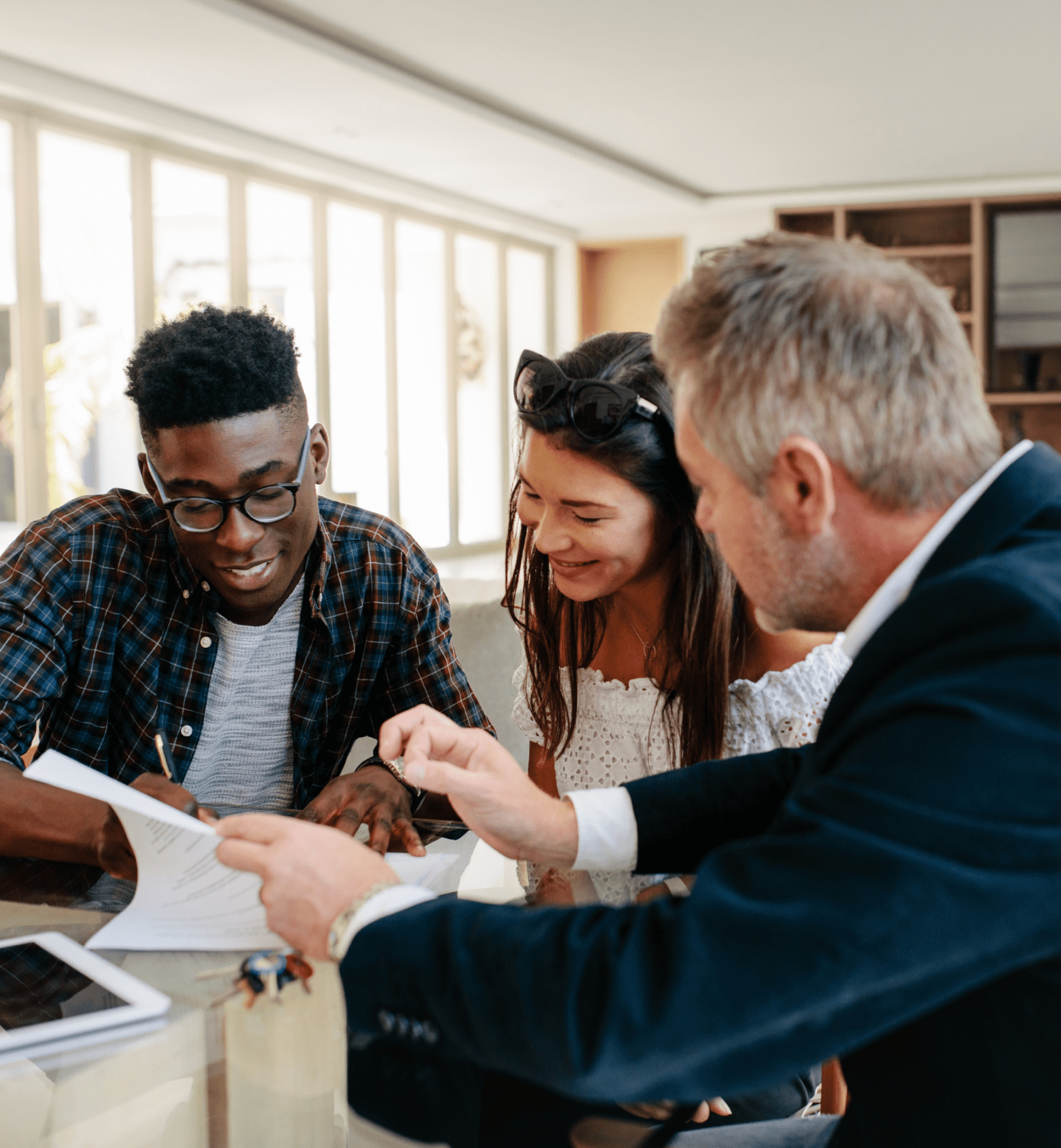 realliance-property-management-brokerage Image of rental property manager having a conversation with potential clients